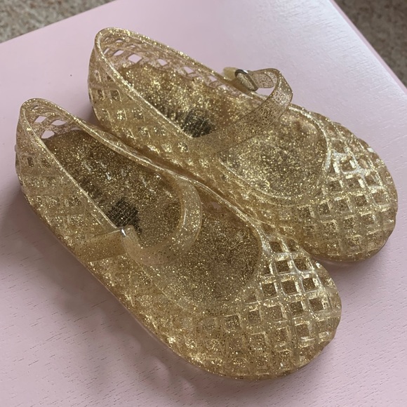 gold jelly shoes